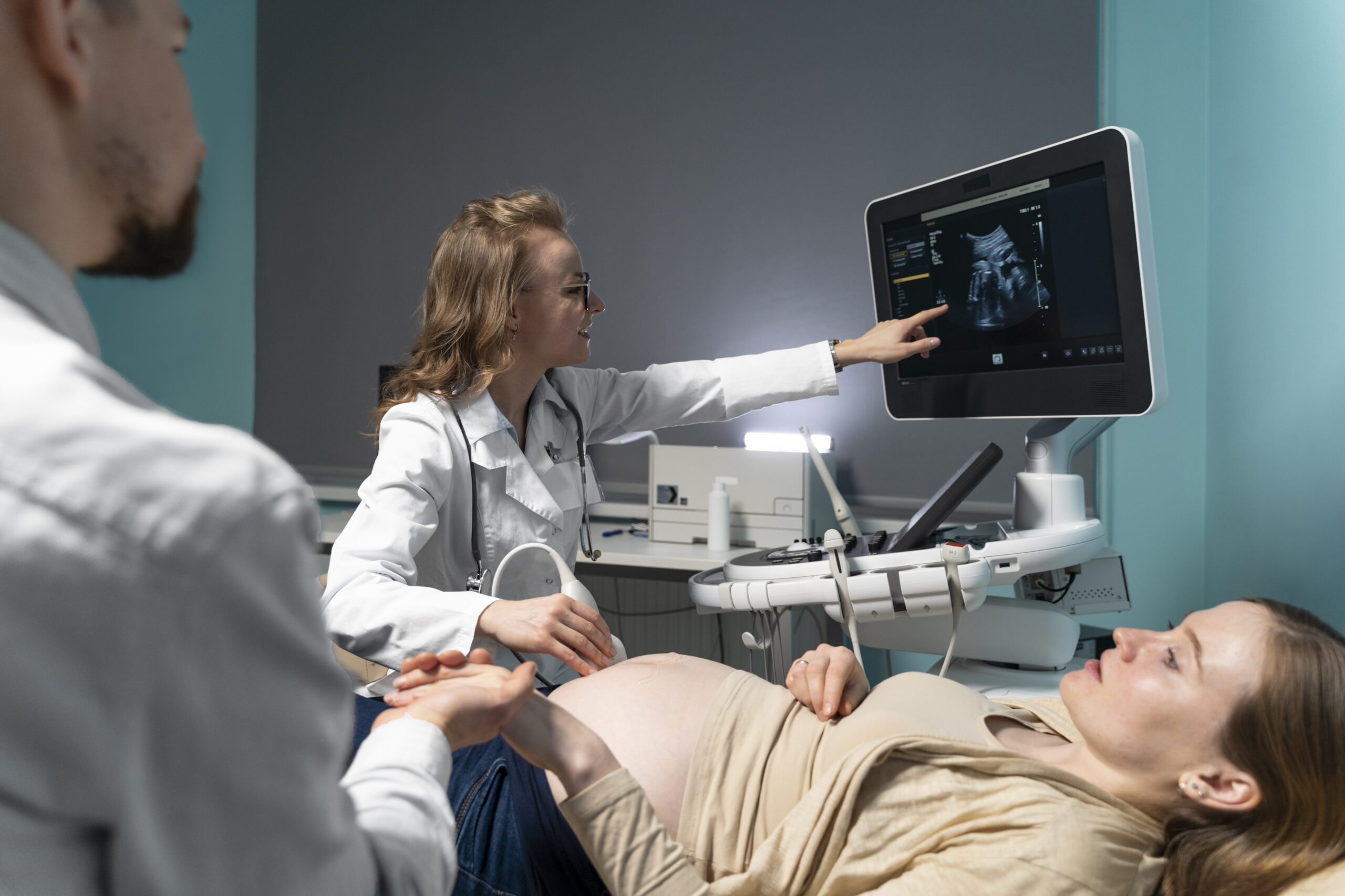 gynecologist performing ultrasound consultation